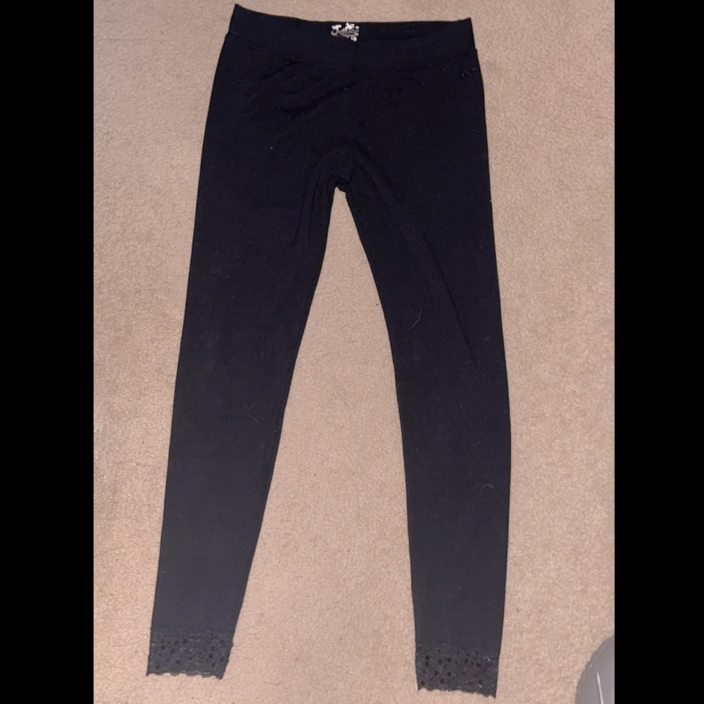 Justice black leggings with lace and sequence at the ankles. Size 18 girls